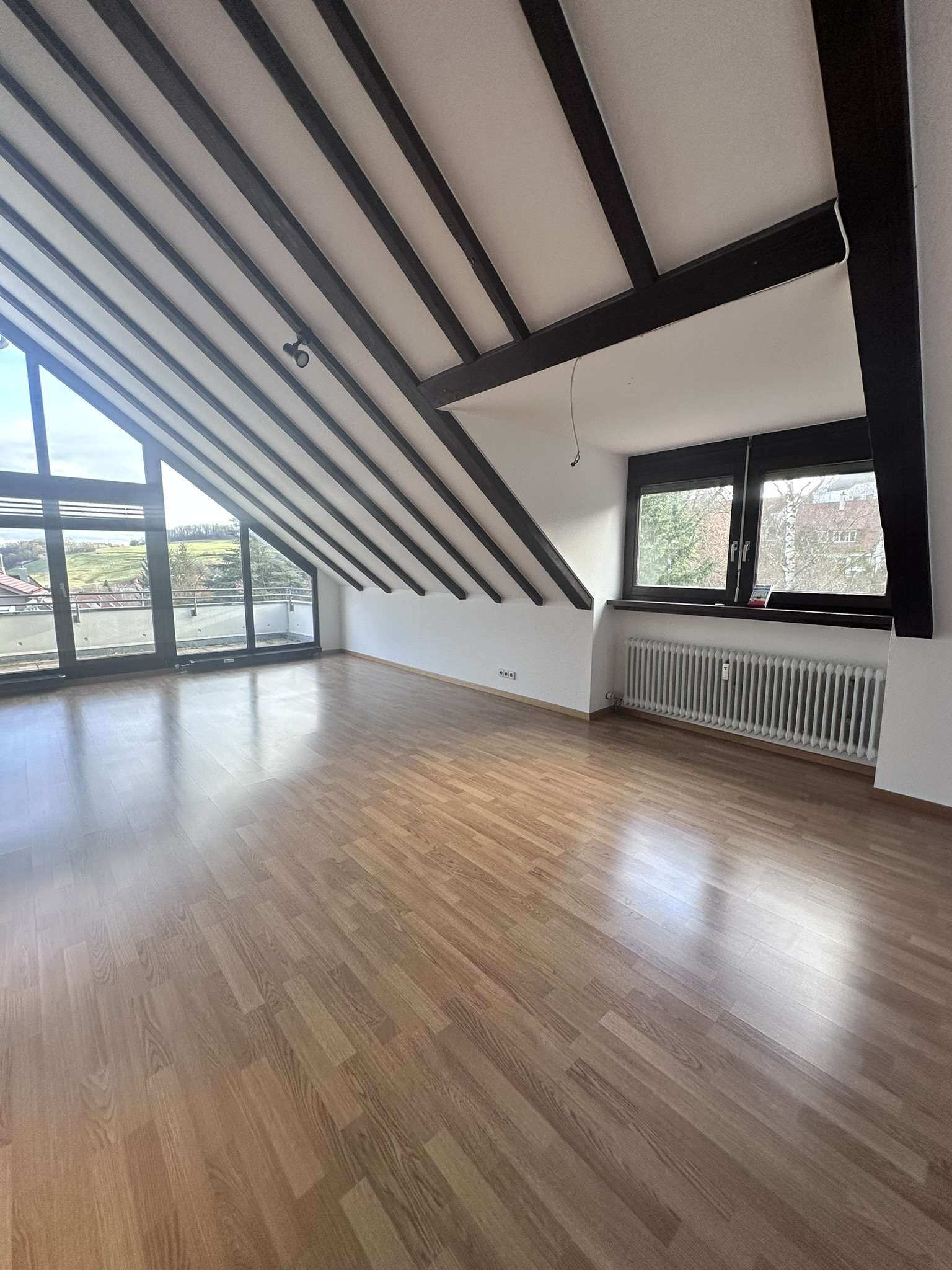 Detailansicht Wohnzimmer der Immobilie Ruhig gelegene 3,5-Zimmer-Maisonettewohnung in Tübingen